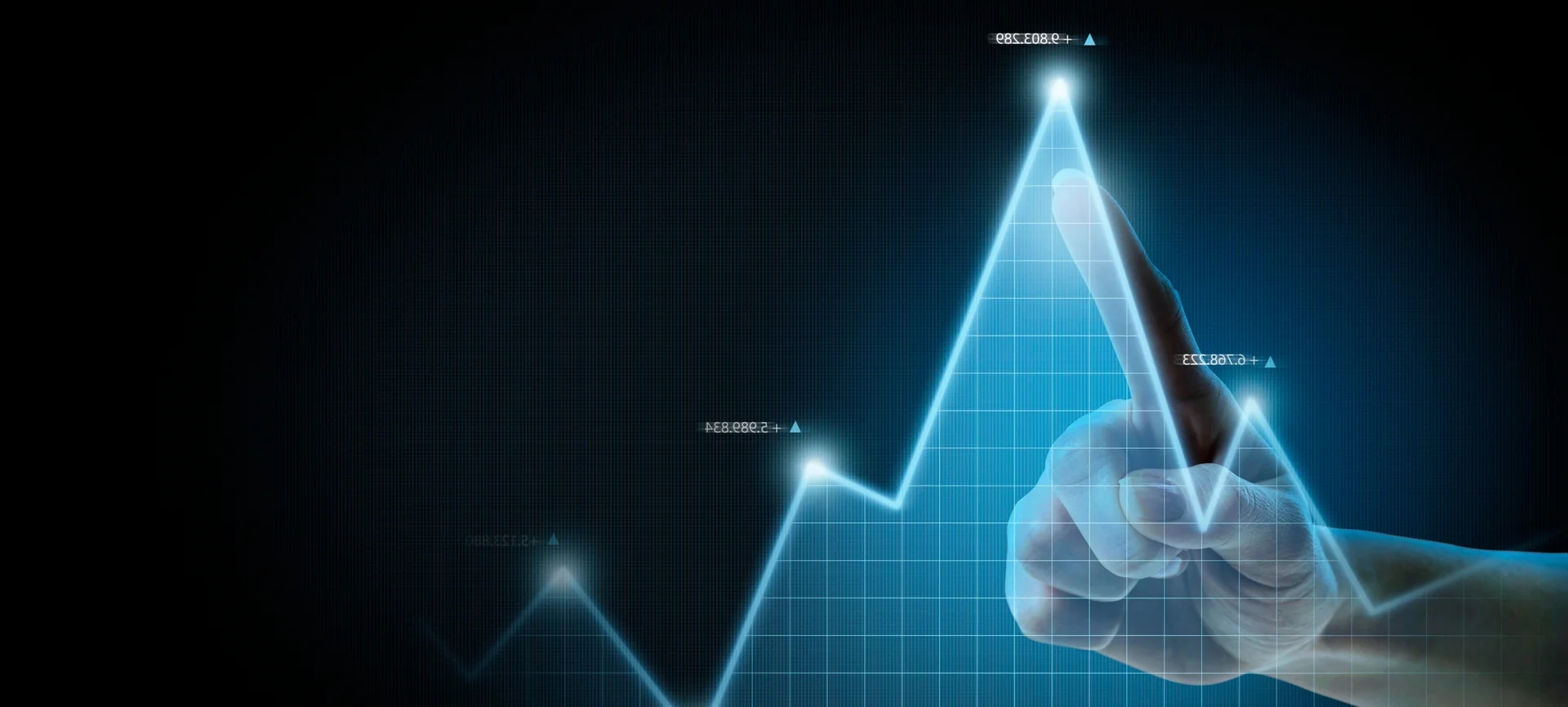 A hand pointing at a graph with a finger, representing finance and banking IT solutions