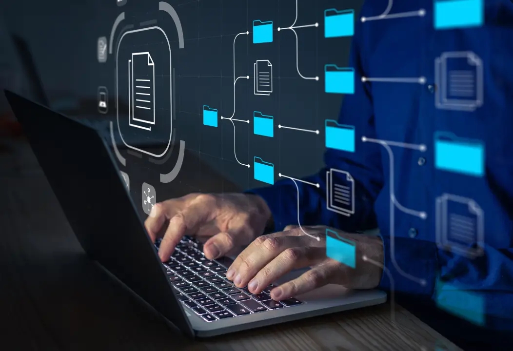 Illustration of a person analyzing data on a computer screen.