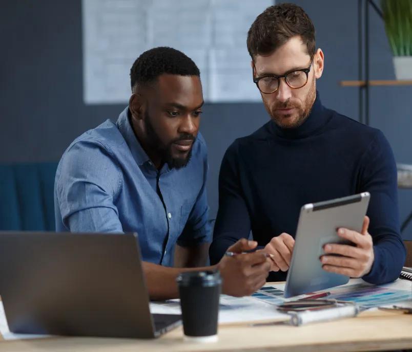 Two men discussing in an office