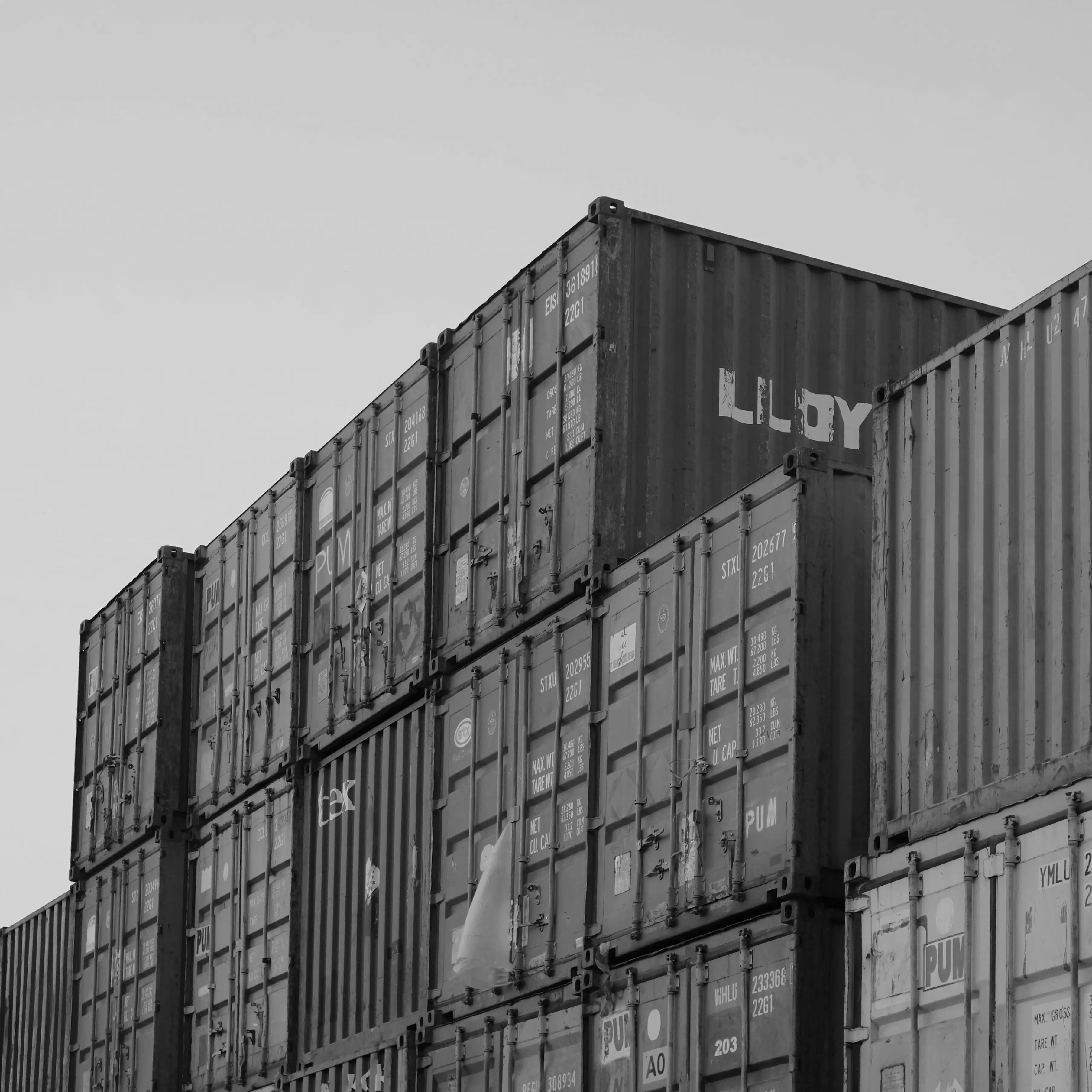 Supply chain, warehousing, and distribution operators coordinating logistics in a large modern facility.